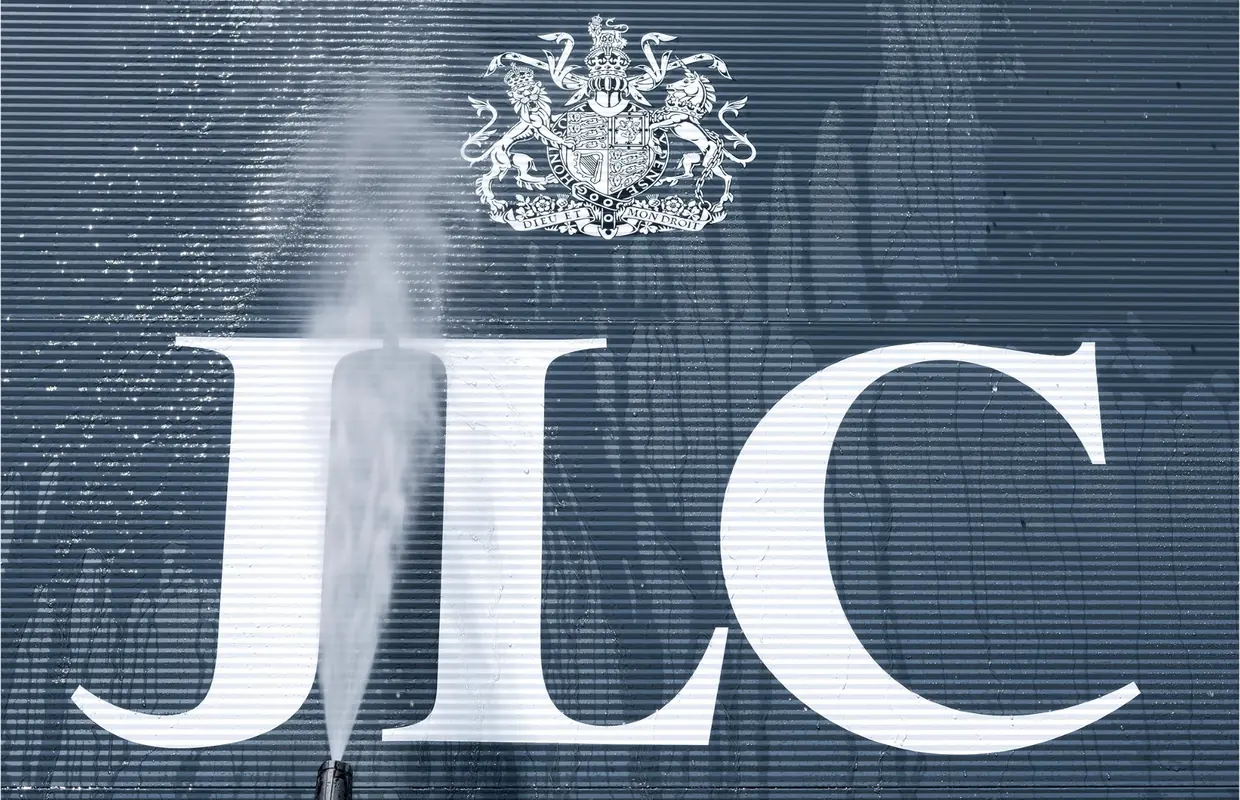 The JLC lettering and Royal Warrant crest on the Sevenoaks building being pressure washed