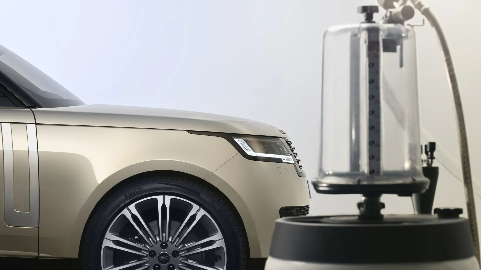 Front of a Range Rover being prepared for service in the JLC workshop