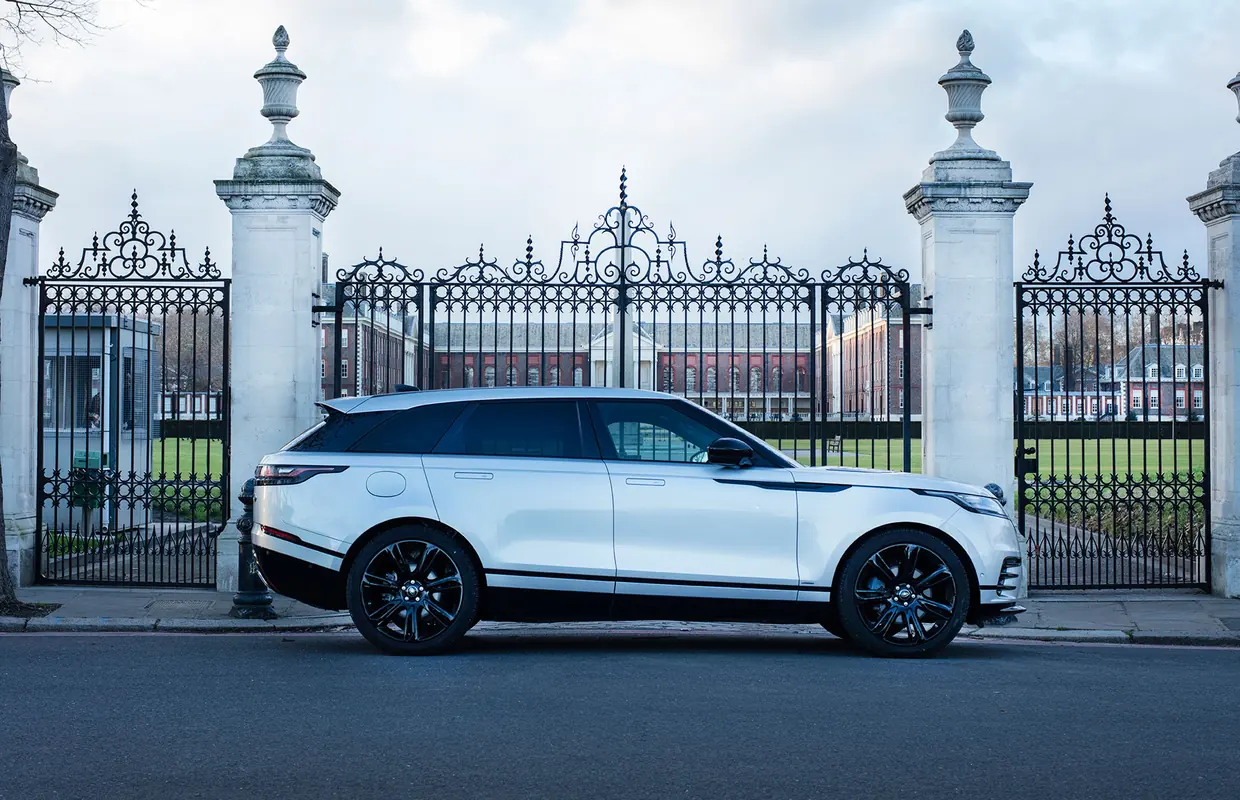 A white Range Rover Velar parked outside the gates of the Royal Hospital Chelsea in London